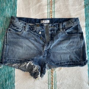 Free People distressed denim shorts